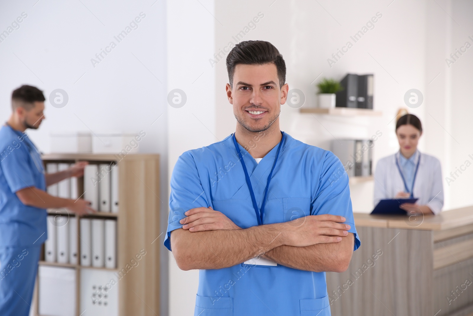 Photo of Portrait of male doctor in modern clinic