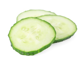 Photo of Slices of fresh cucumber on white background