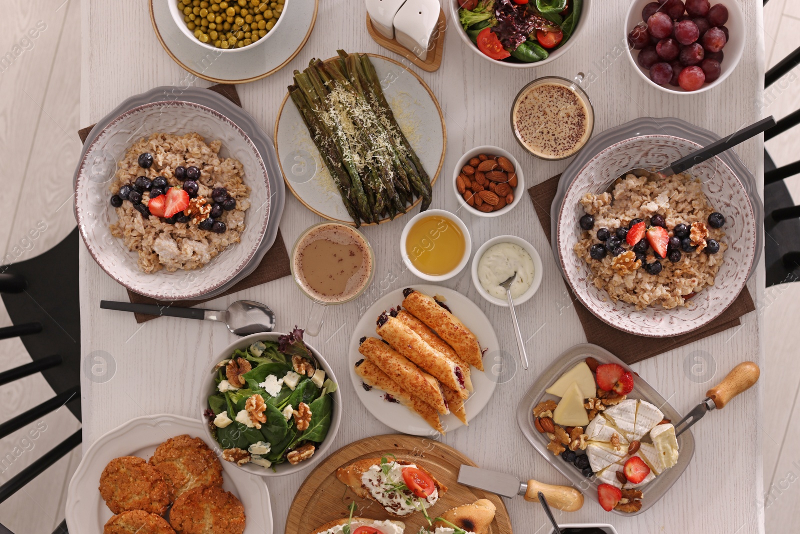 Photo of Many different dishes served on buffet table for brunch, flat lay