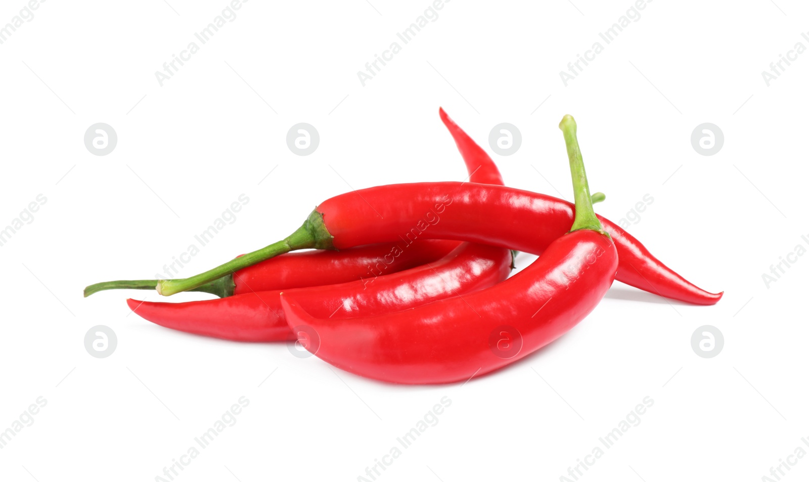 Photo of Ripe red hot chili peppers isolated on white