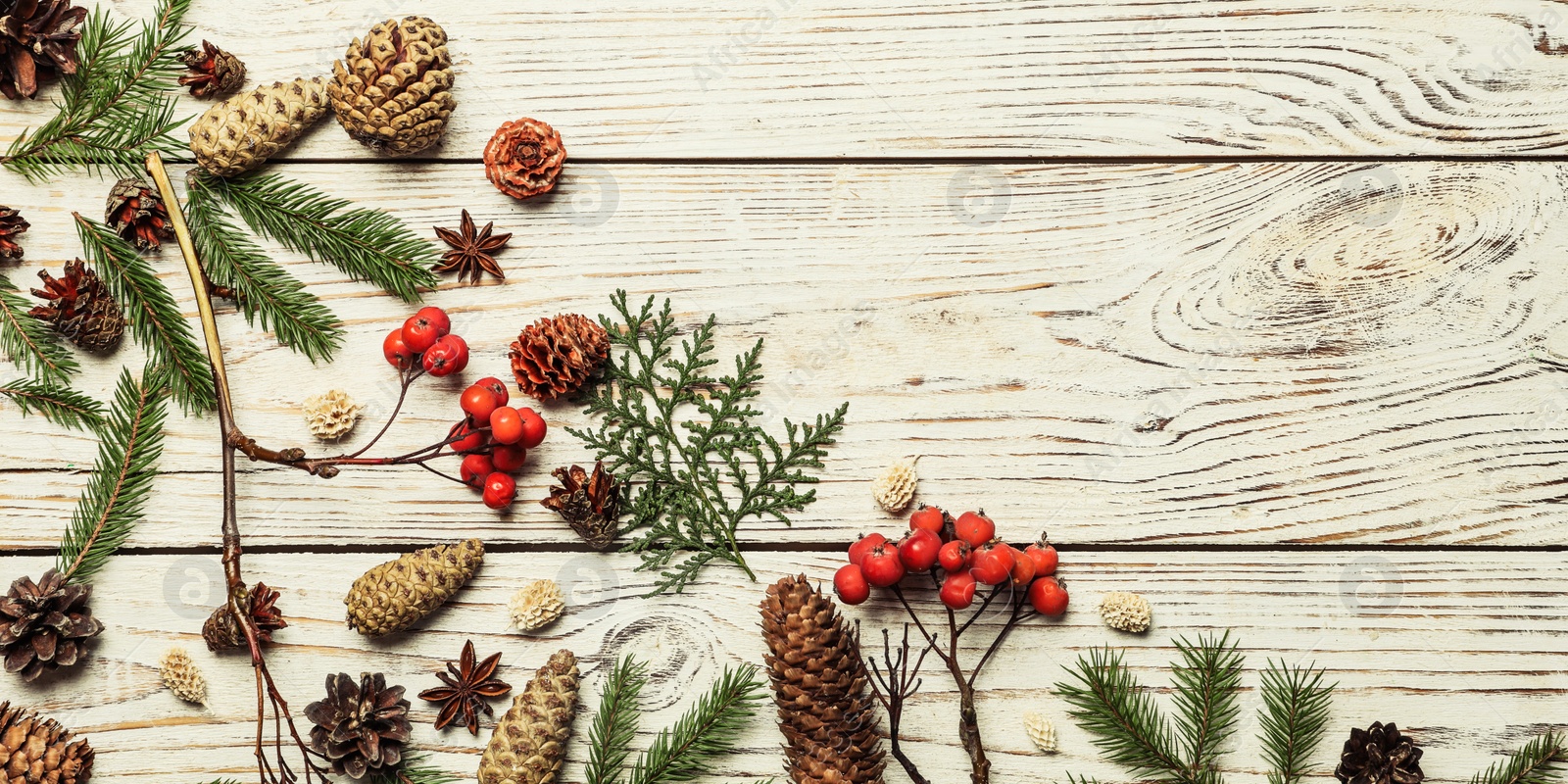 Image of Flat lay composition with pinecones on white wooden background, space for text. Horizontal banner design