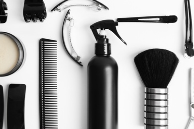 Photo of Professional hairdresser tools on white background
