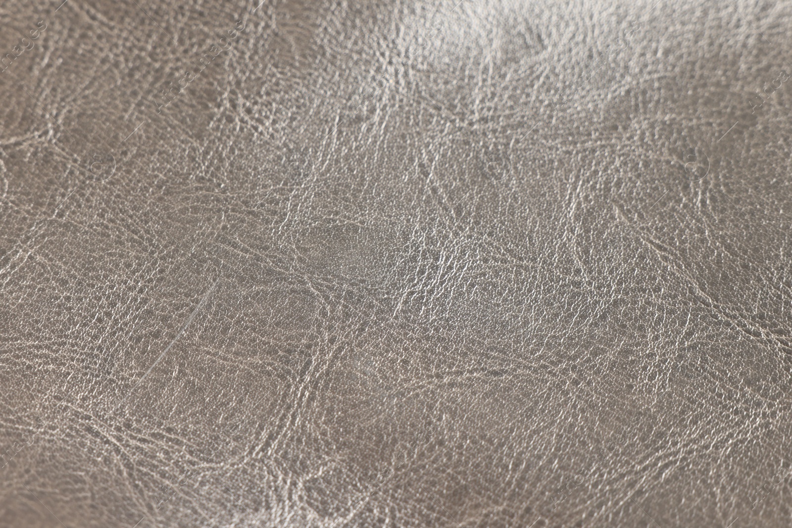 Photo of Natural leather with wrinkles as background, closeup view