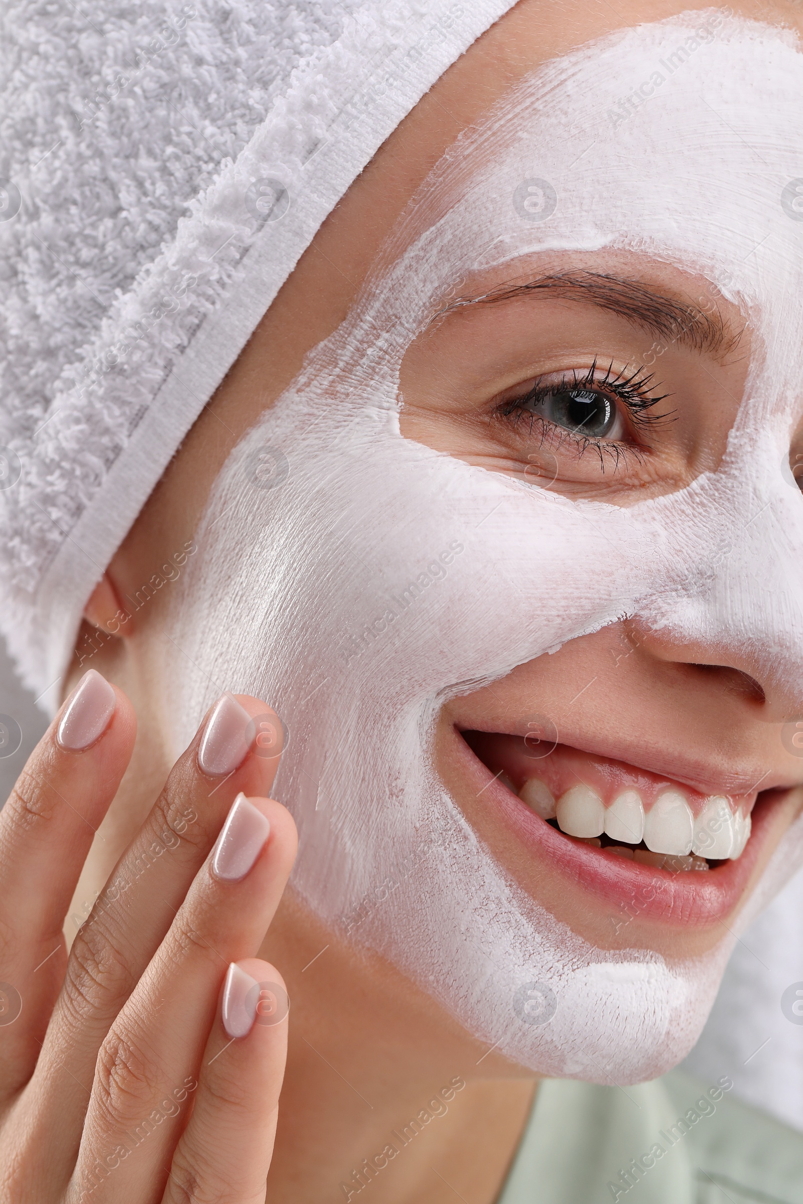 Photo of Woman with face mask, closeup. Spa treatments