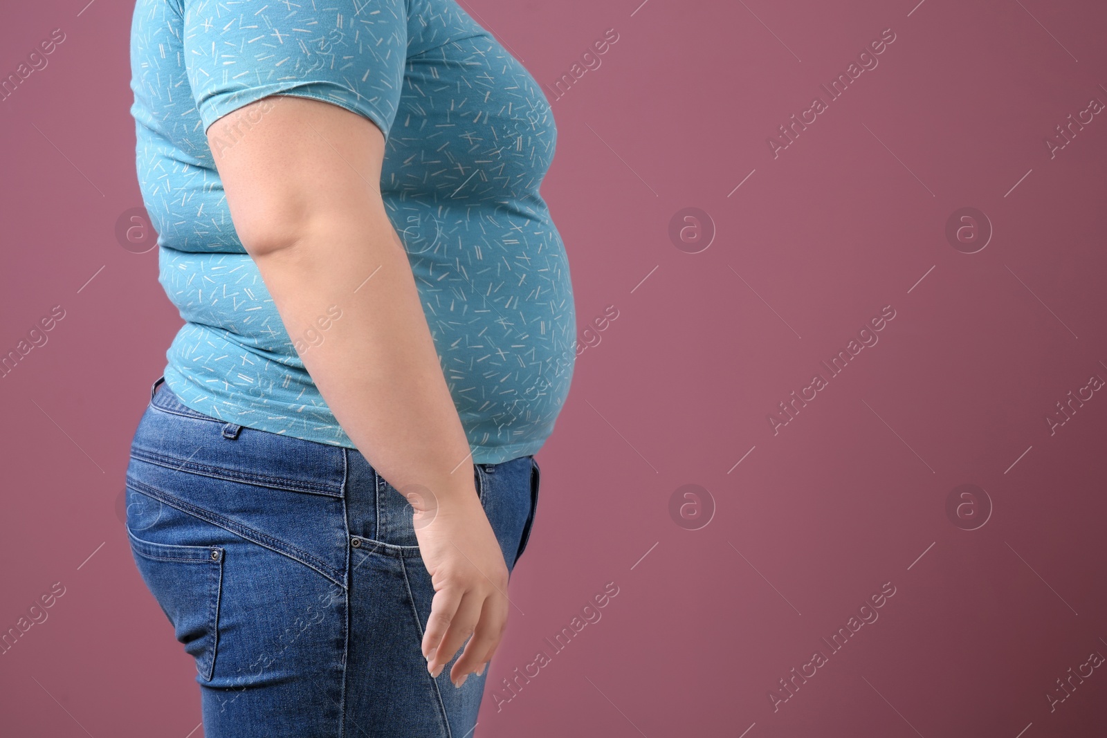 Photo of Overweight woman on color background