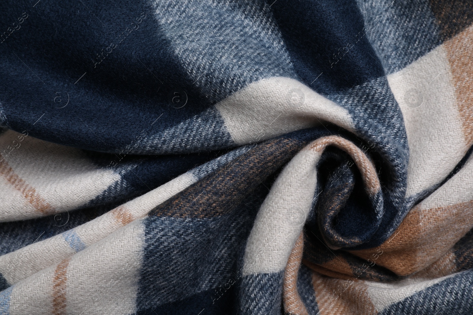 Photo of Soft checkered scarf as background, top view