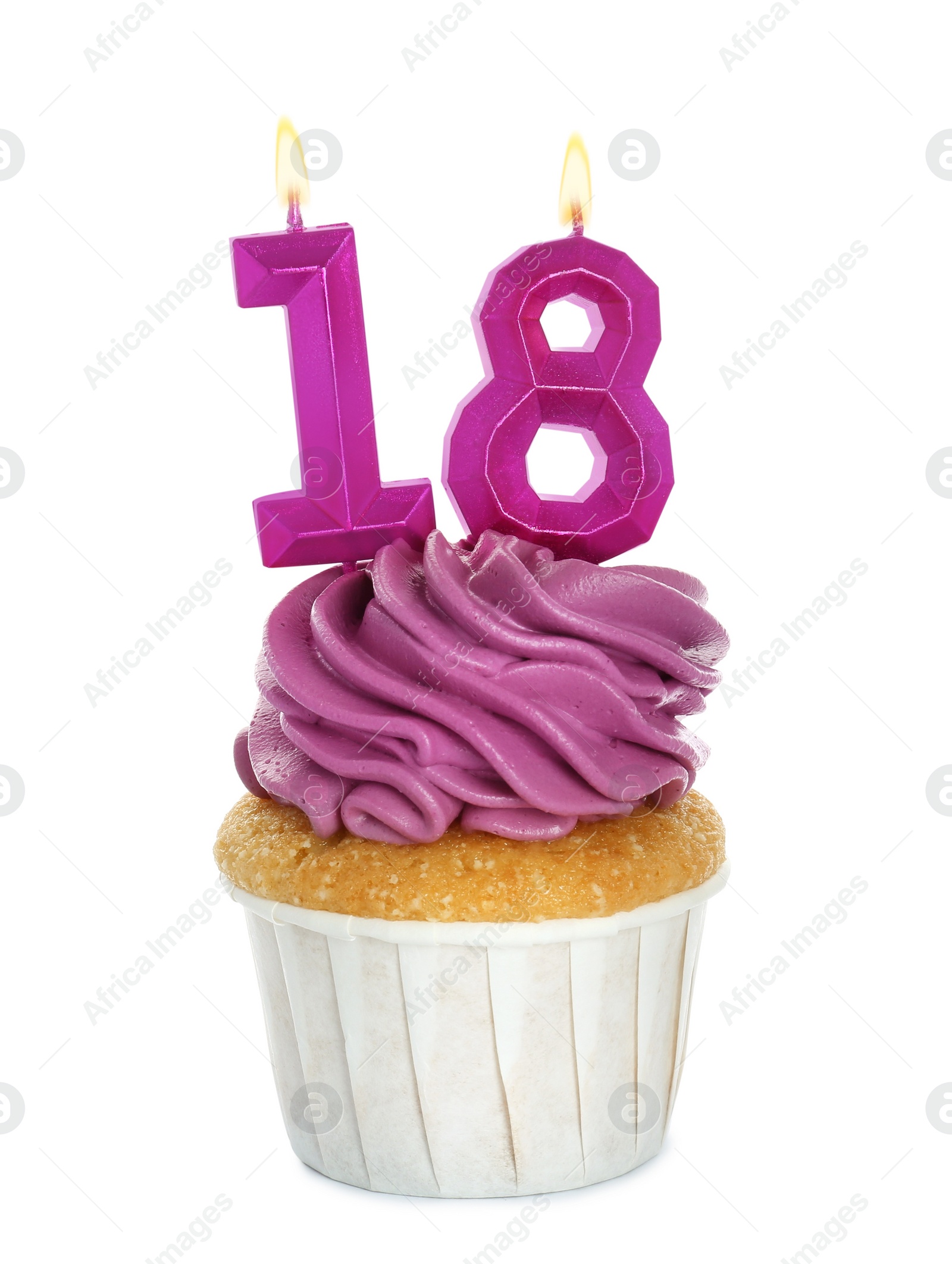 Photo of Delicious cupcake with number shaped candles on white background. Coming of age party - 18th birthday