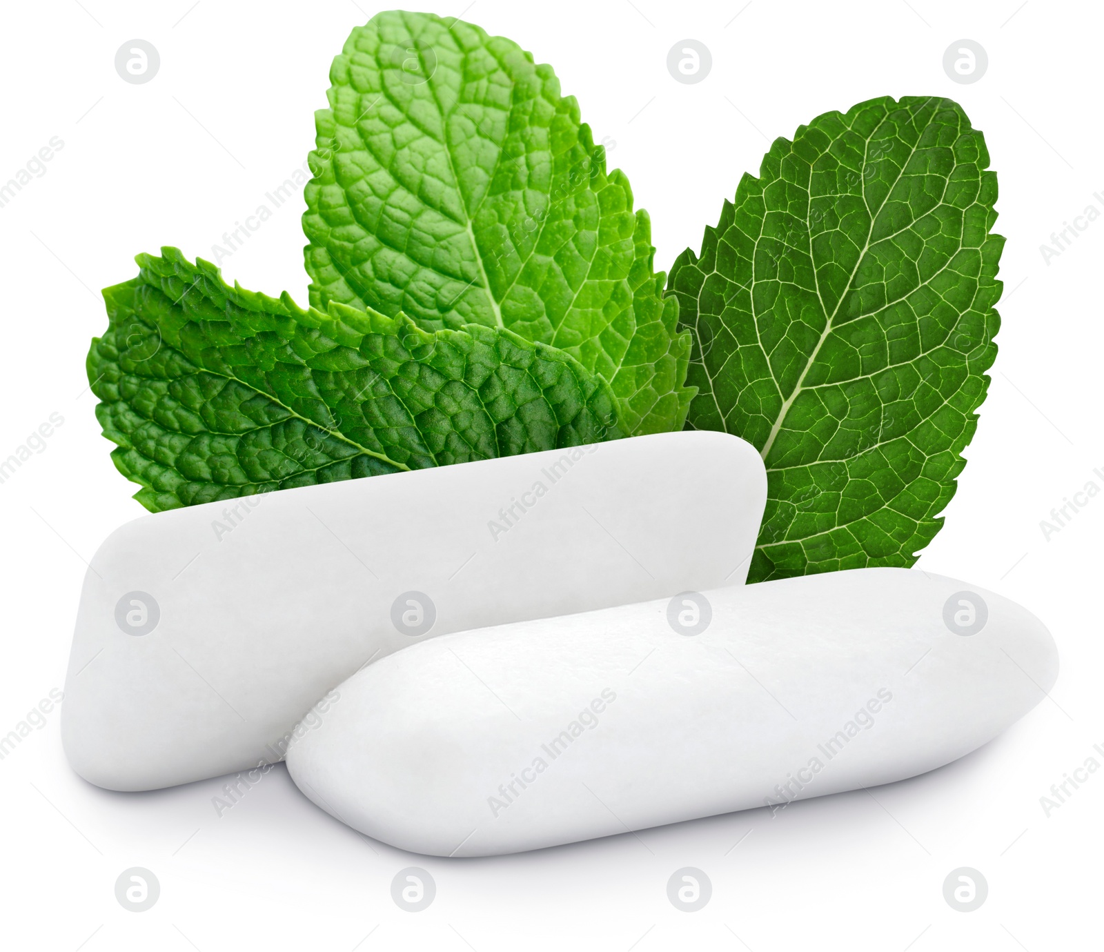 Image of Menthol chewing gum pillows and mint leaves on white background