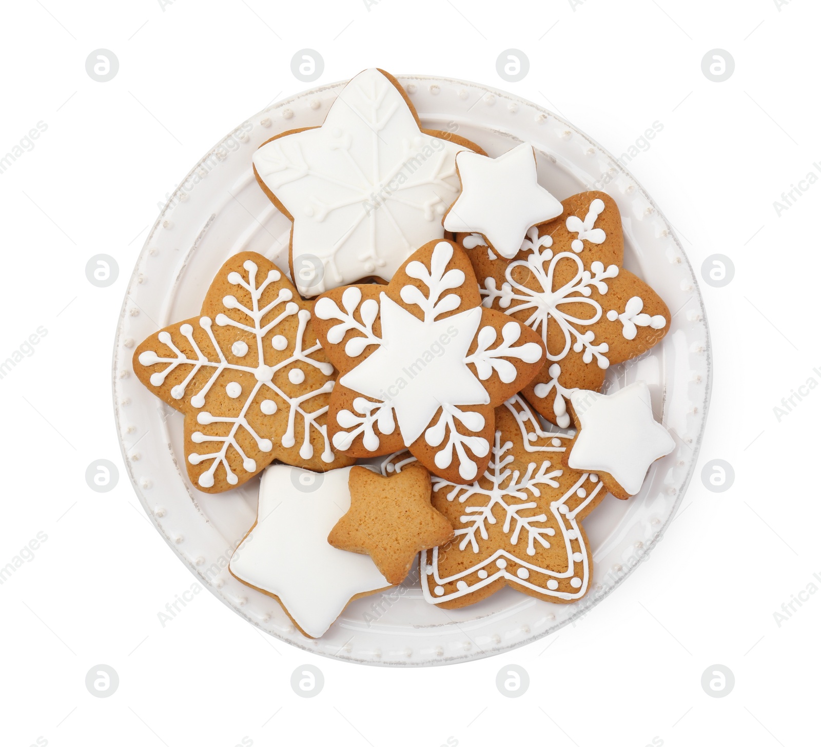 Photo of Tasty star shaped Christmas cookies with icing isolated on white, top view