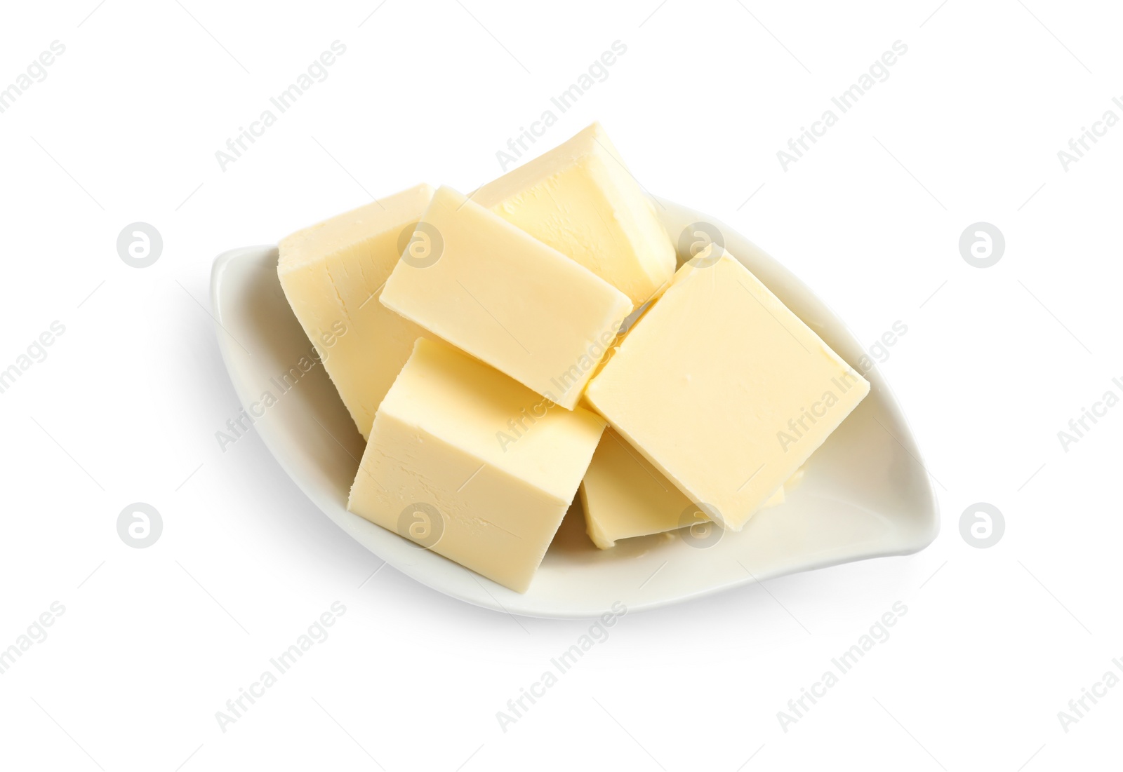 Photo of Ceramic dish with cut butter on white background, top view