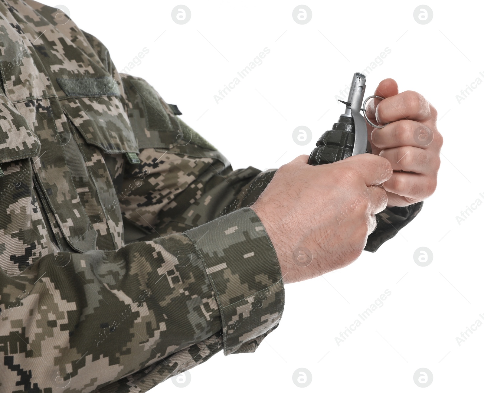 Photo of Soldier pulling safety pin out of hand grenade on white background, closeup. Military service