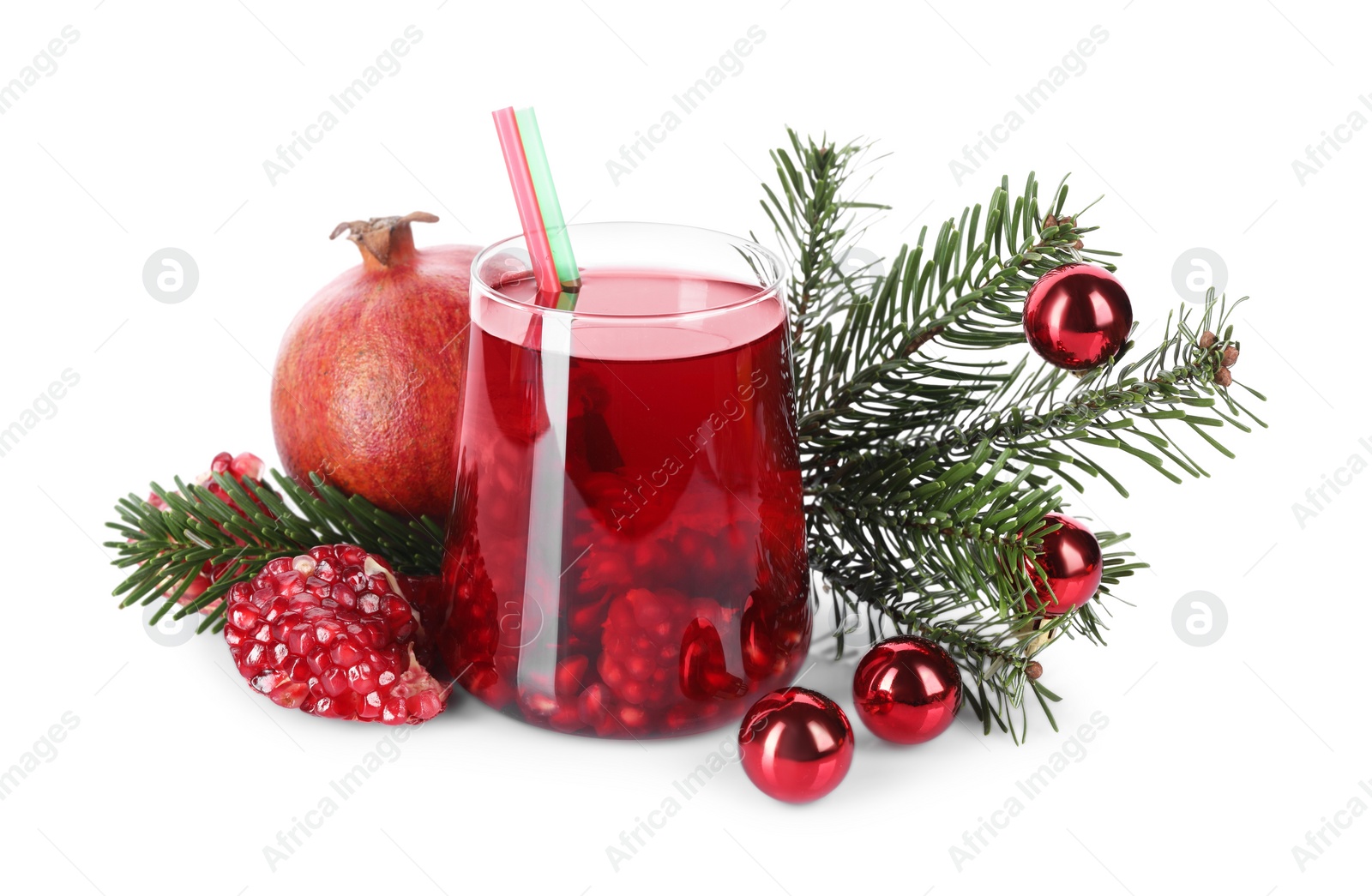 Photo of Aromatic Sangria drink in glass, pomegranates and Christmas decor isolated on white