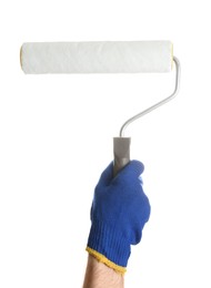 Man holding paint roller brush on white background, closeup