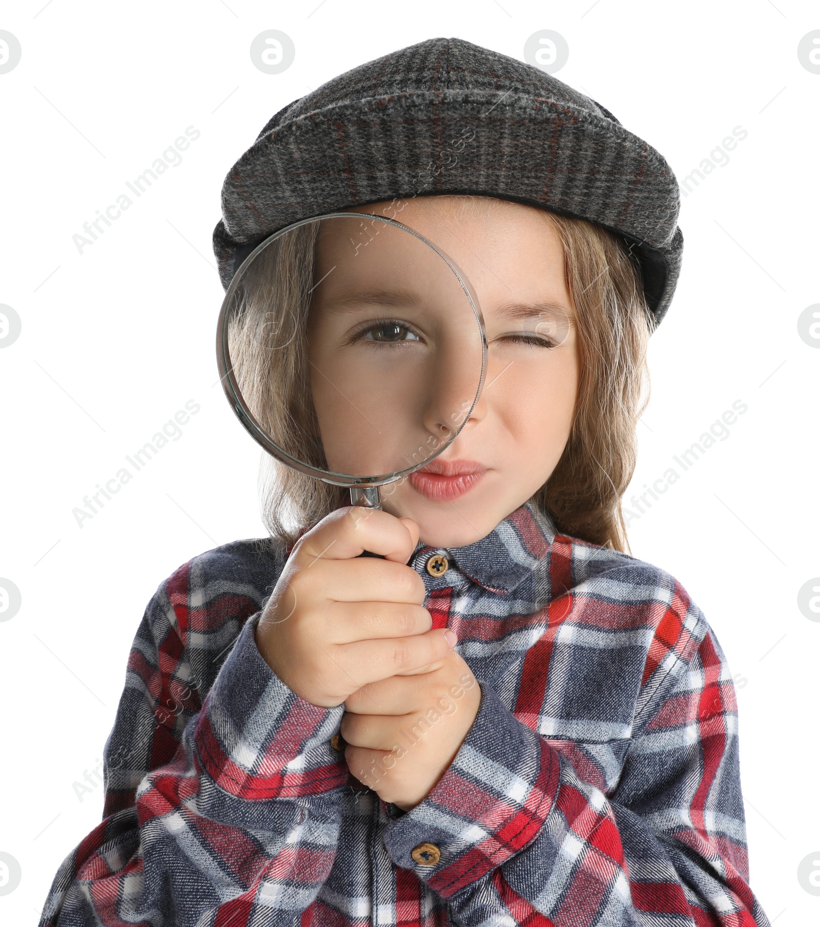 Photo of Cute little child in hat with magnifying glass playing detective on white background