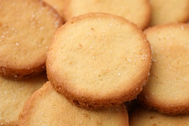 Photo of Tasty sweet sugar cookies as background, closeup