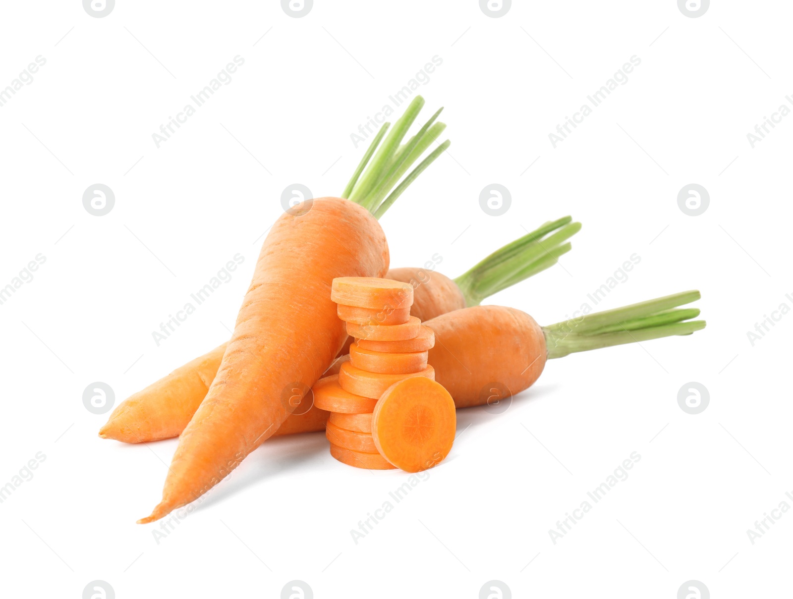 Photo of Whole and cut ripe carrots isolated on white