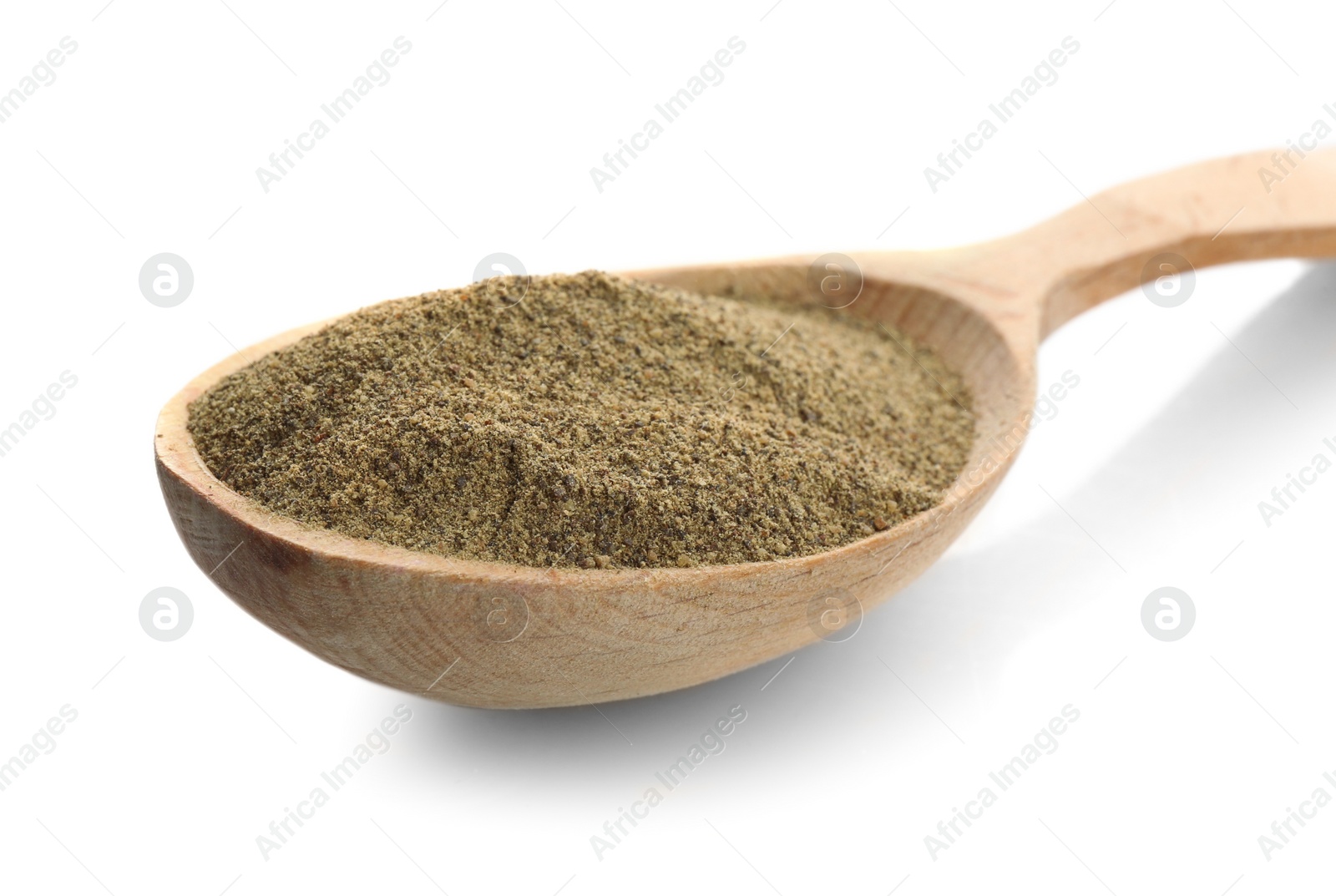 Photo of Wooden spoon with pepper powder on white background