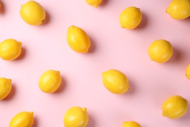 Photo of Flat lay composition with fresh ripe lemons on color background