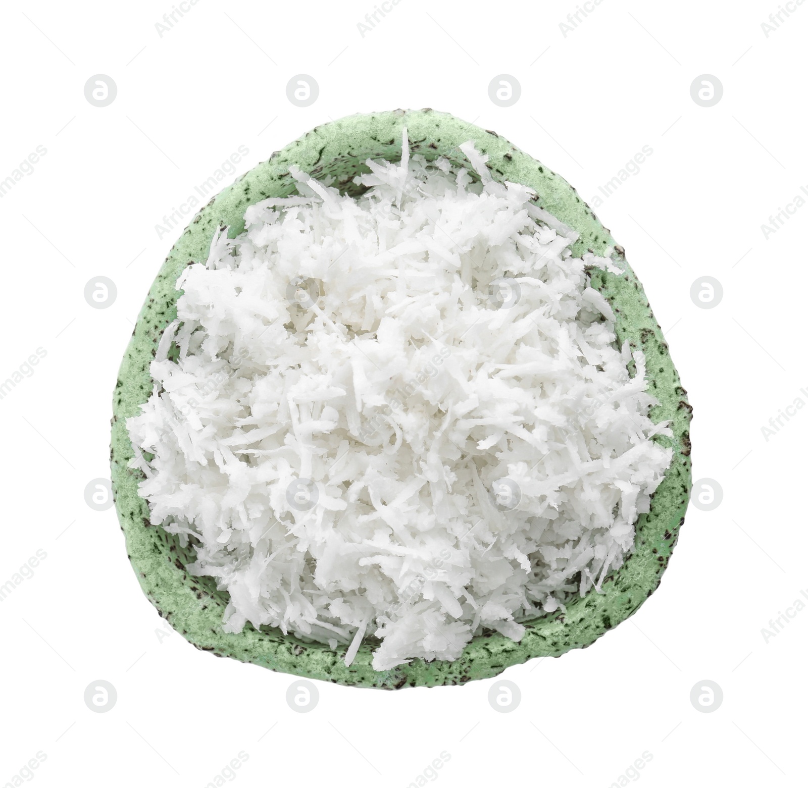 Photo of Fresh coconut flakes in bowl on white background, top view