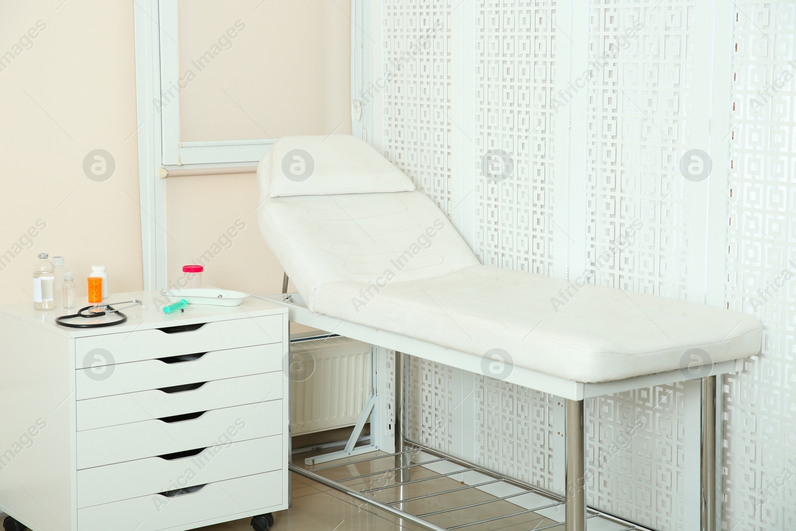 Photo of Modern interior of doctor's office with couch