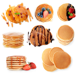 Image of Set of delicious pancakes with different toppings on white background