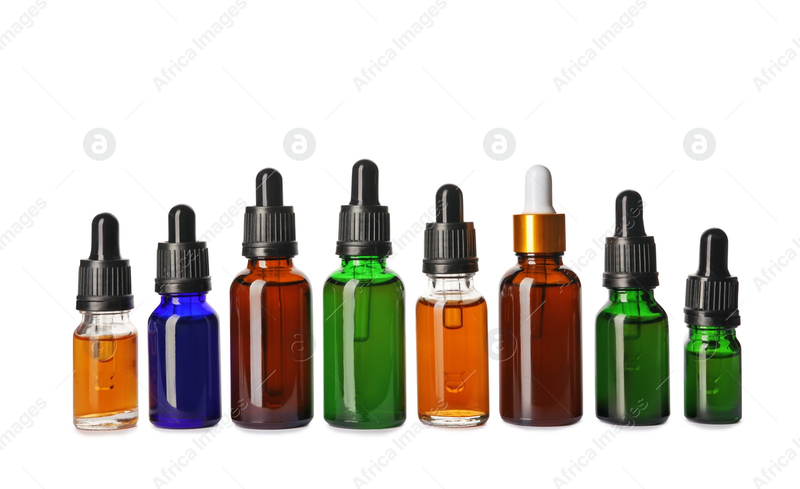 Photo of Cosmetic bottles of essential oils on white background