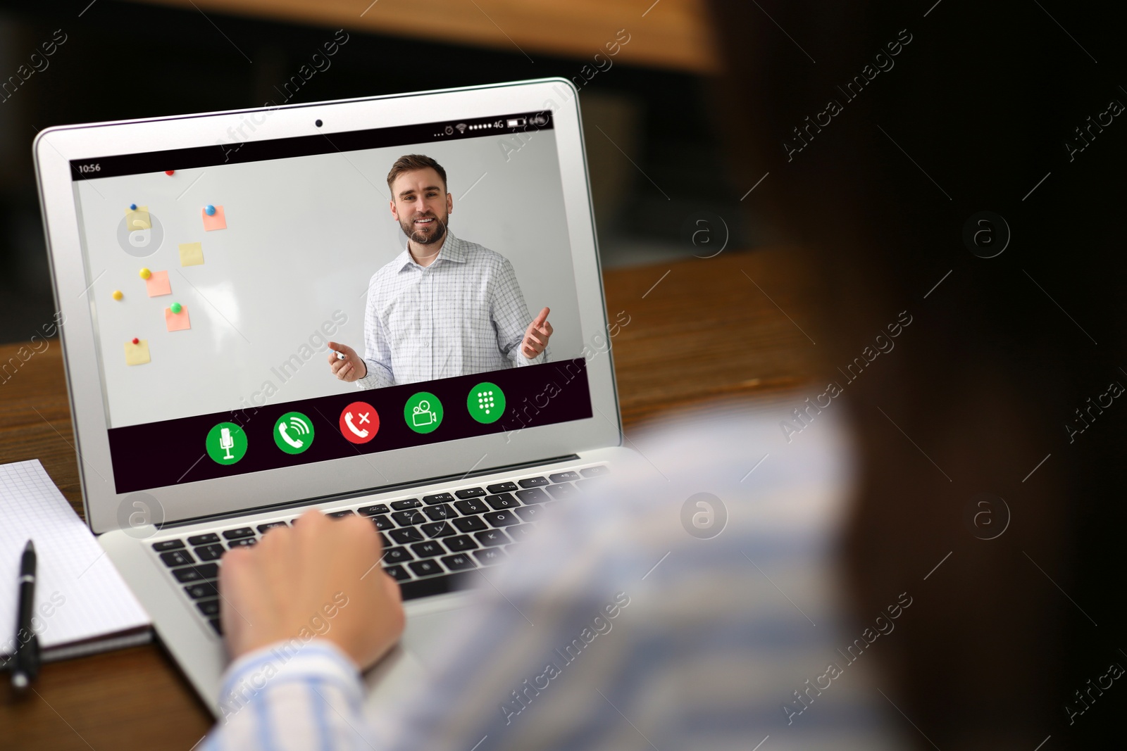 Image of Woman having online video consultation with business trainer at table, closeup