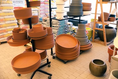 Many different flower pots in gardening shop