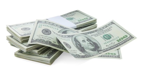 Photo of Many dollar banknotes on white background. American national currency