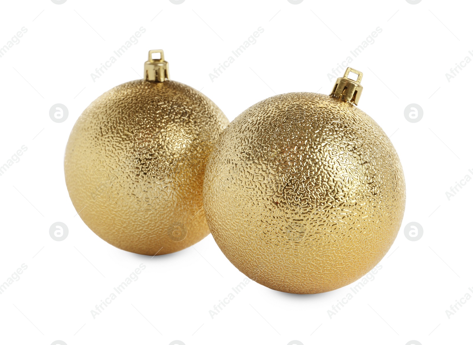 Photo of Beautiful shiny golden Christmas balls on white background