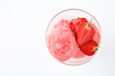 Photo of Delicious strawberry ice cream with fresh berries in dessert bowl on white background, top view