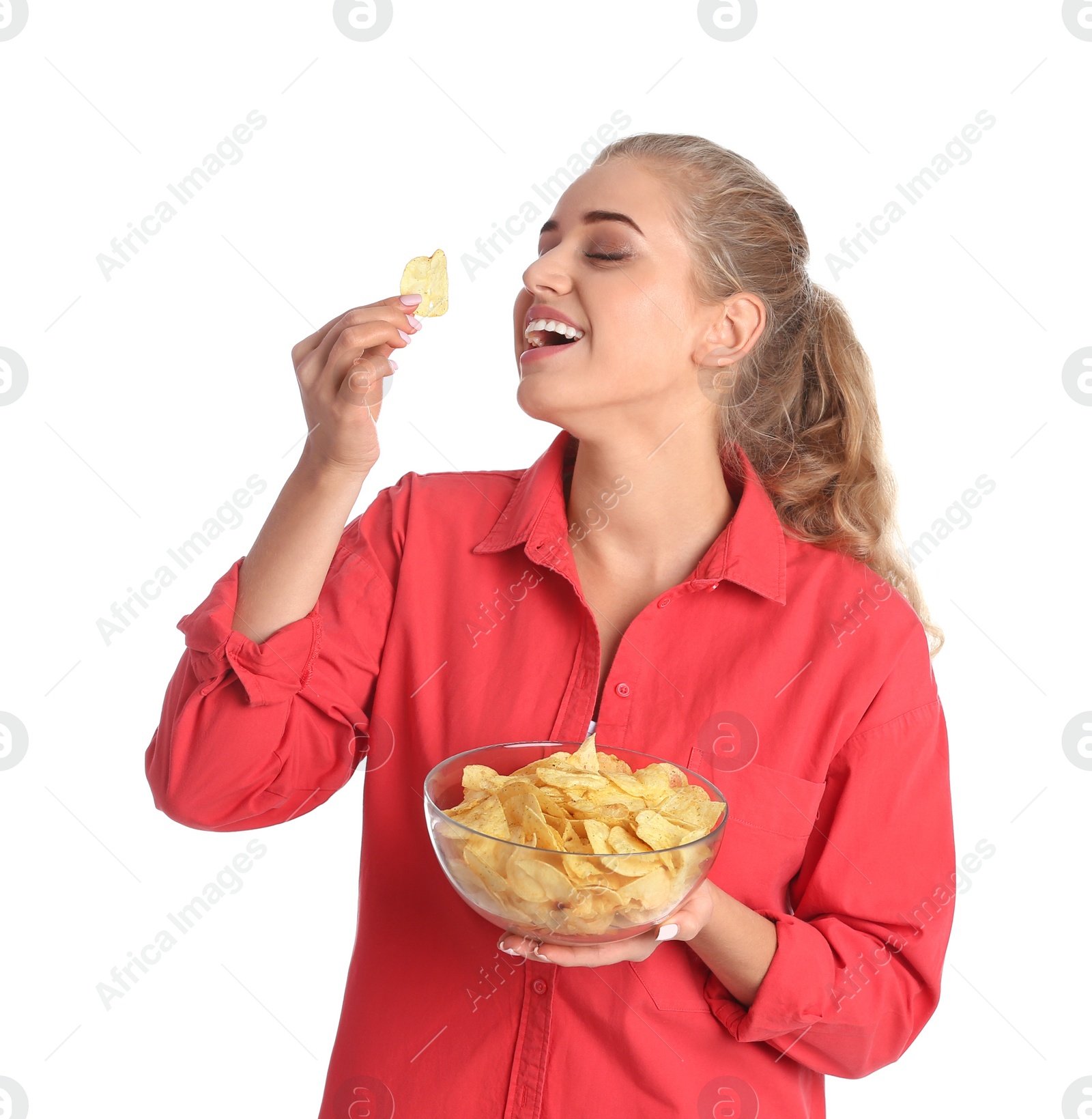 Photo of Woman eating potato chips on white background