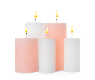 Photo of Set of aromatic candles isolated on white
