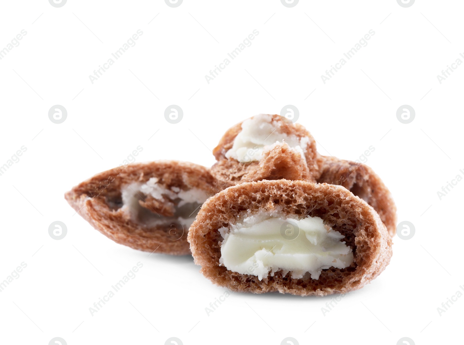 Photo of Chocolate corn pads with milk filling on white background