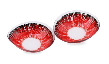 Photo of Two red contact lenses isolated on white