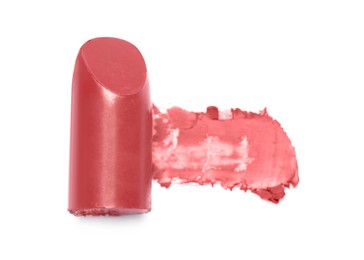 Beautiful lipstick and smear on white background, top view