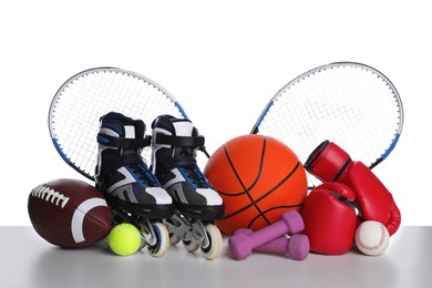 Photo of Set of different sports equipment on white background