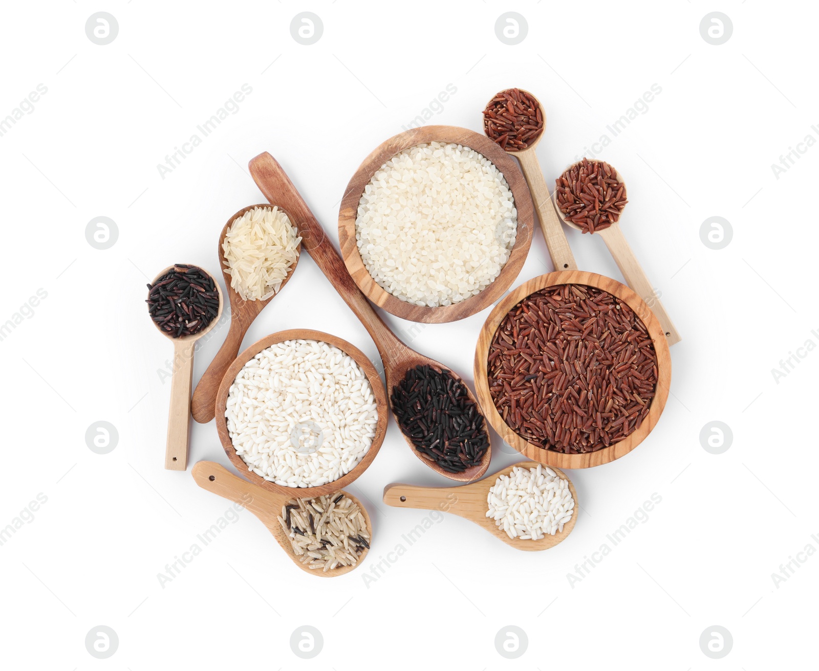 Photo of Different sorts of rice isolated on white, top view