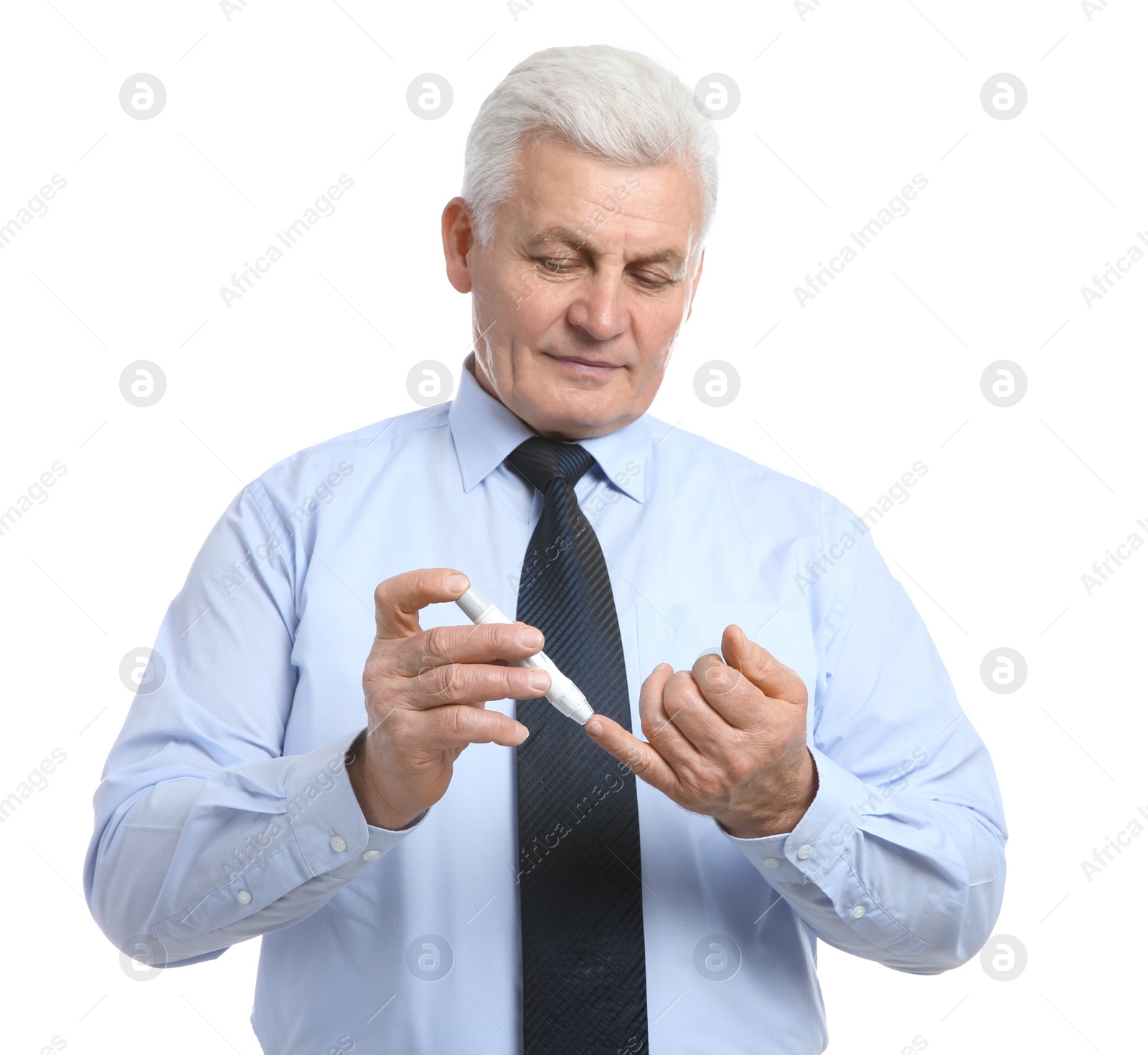 Photo of Senior man using lancet pen on white background. Diabetes control