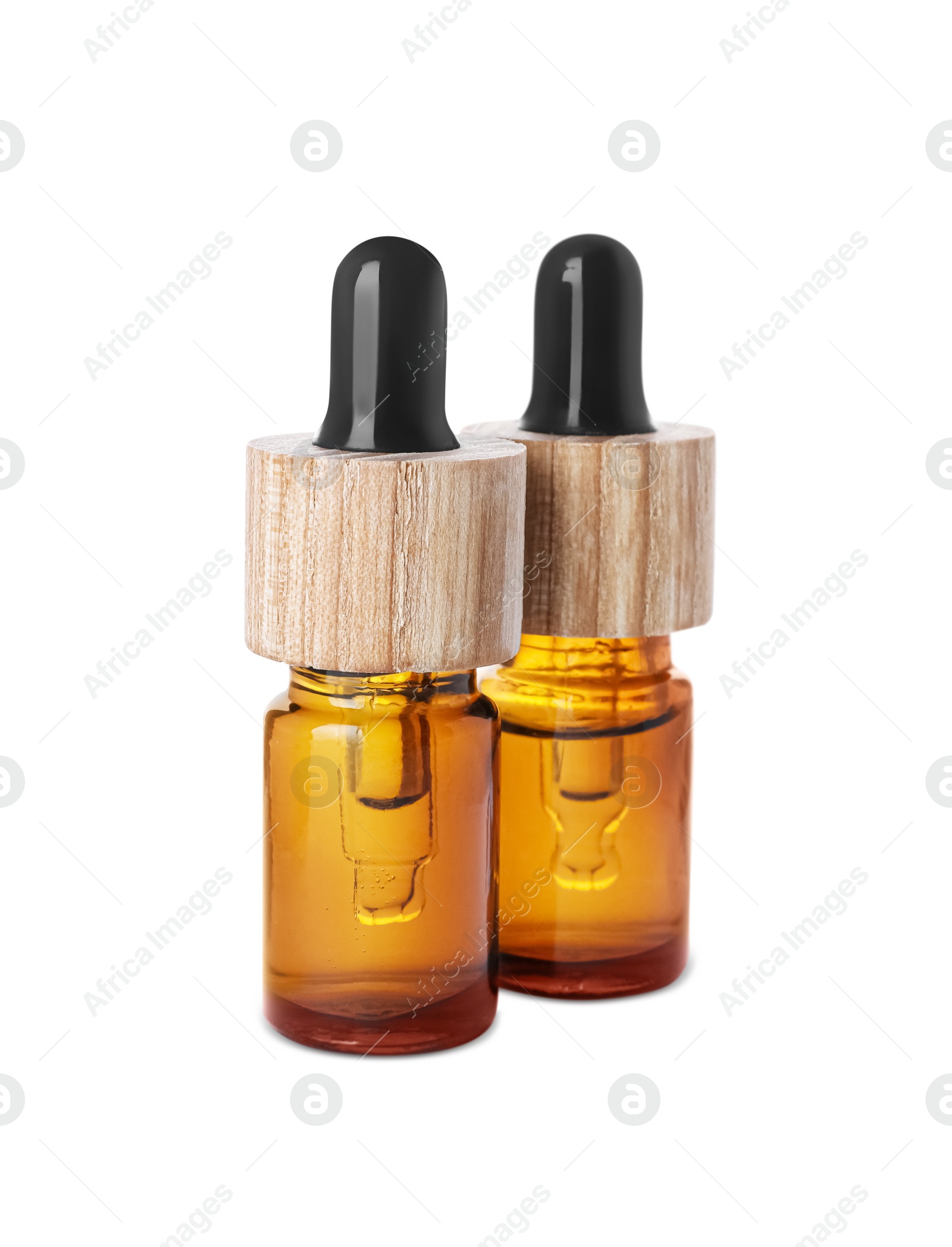Photo of Bottles of essential oil on white background