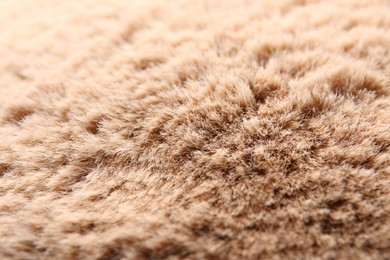 Photo of Texture of brown faux fur as background, closeup