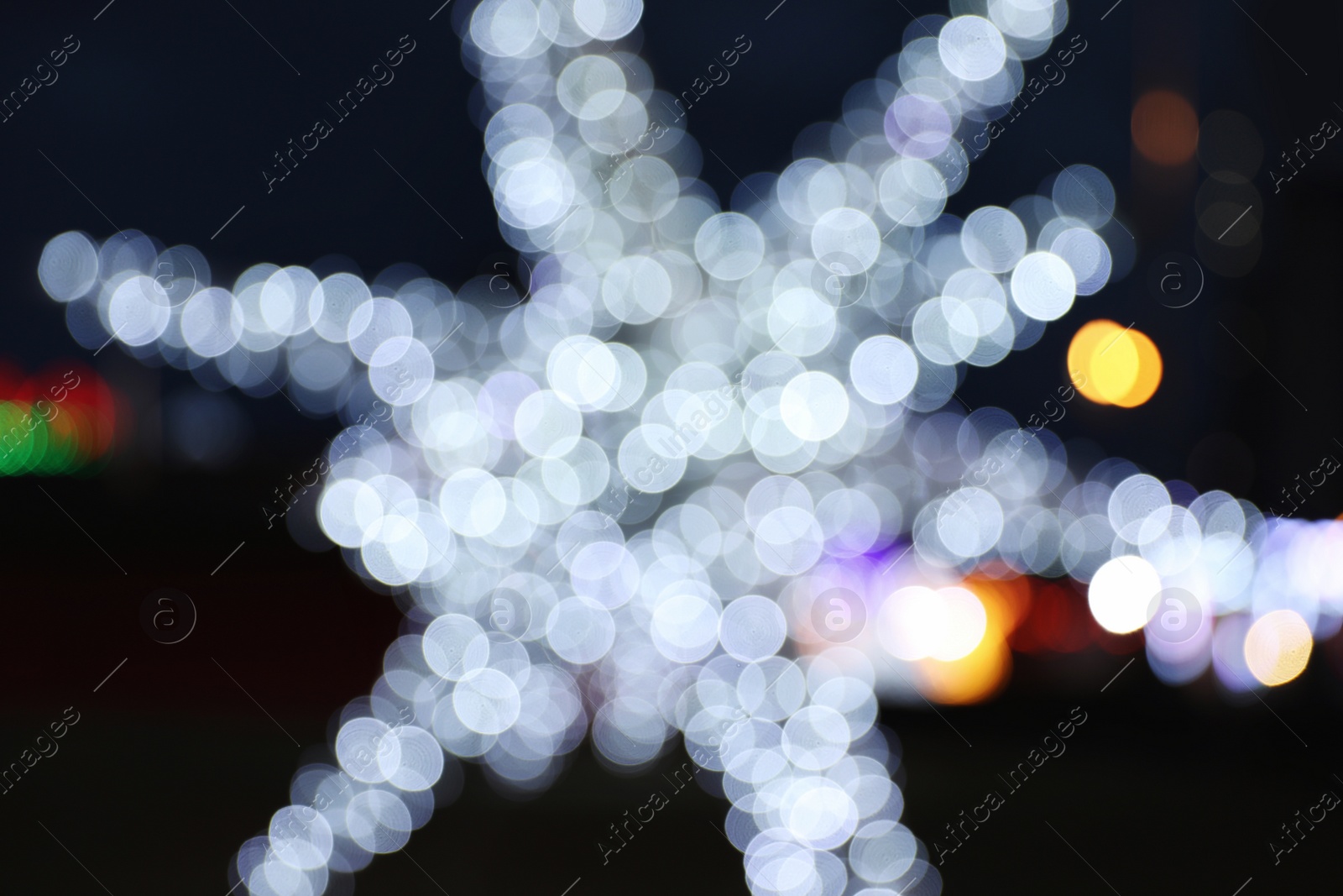 Photo of Beautiful bright Christmas decor outdoors. Bokeh effect