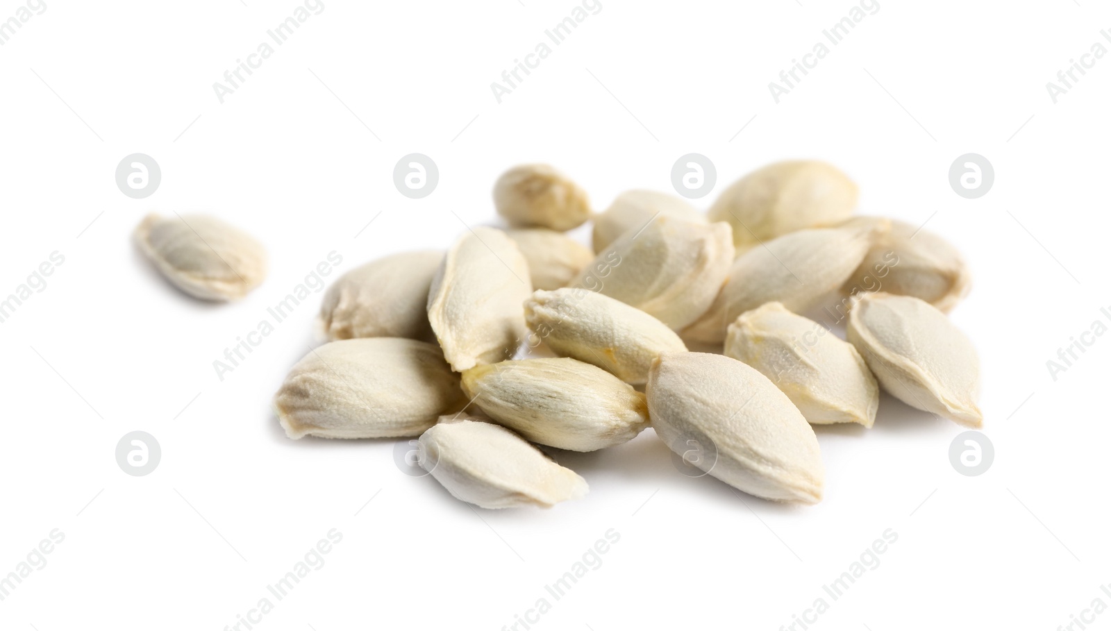 Photo of Many seeds of tangerine isolated on white