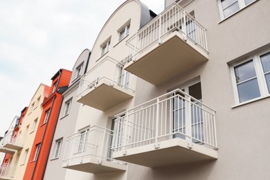 Exterior of beautiful building with empty balconies