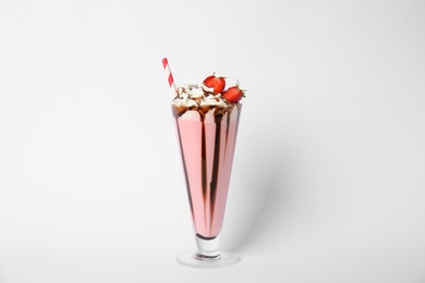 Photo of Glass of tasty milk shake on white background