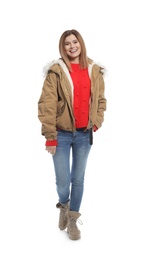 Photo of Young woman wearing warm clothes on white background. Ready for winter vacation