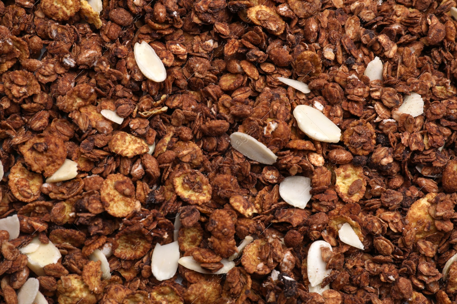 Photo of Sweet tasty granola as background, closeup view