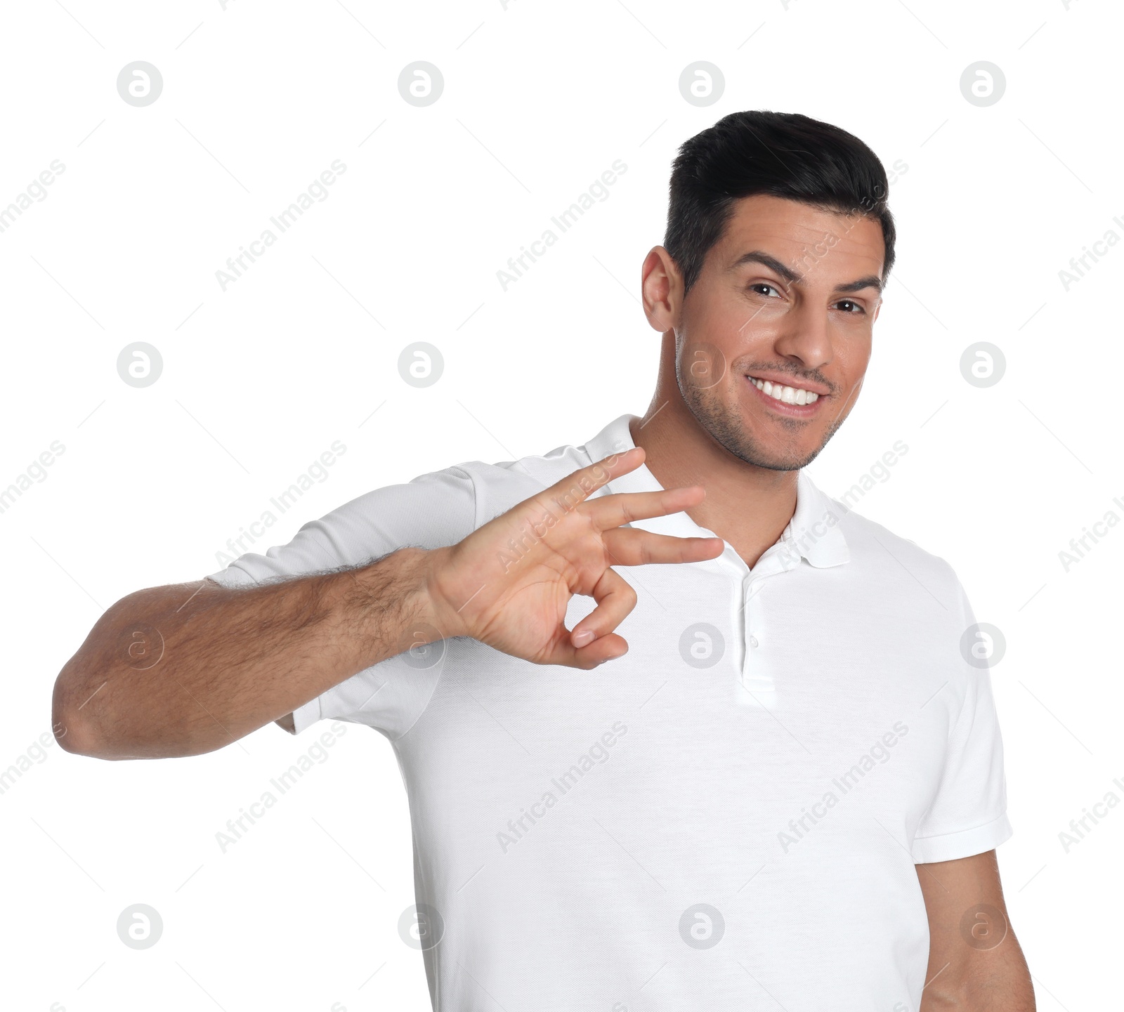 Photo of Man showing number three with his hand on white background