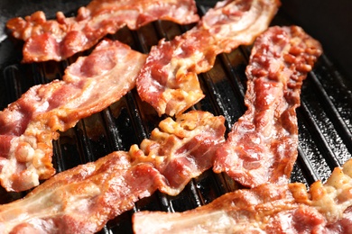 Grill pan with bacon, closeup