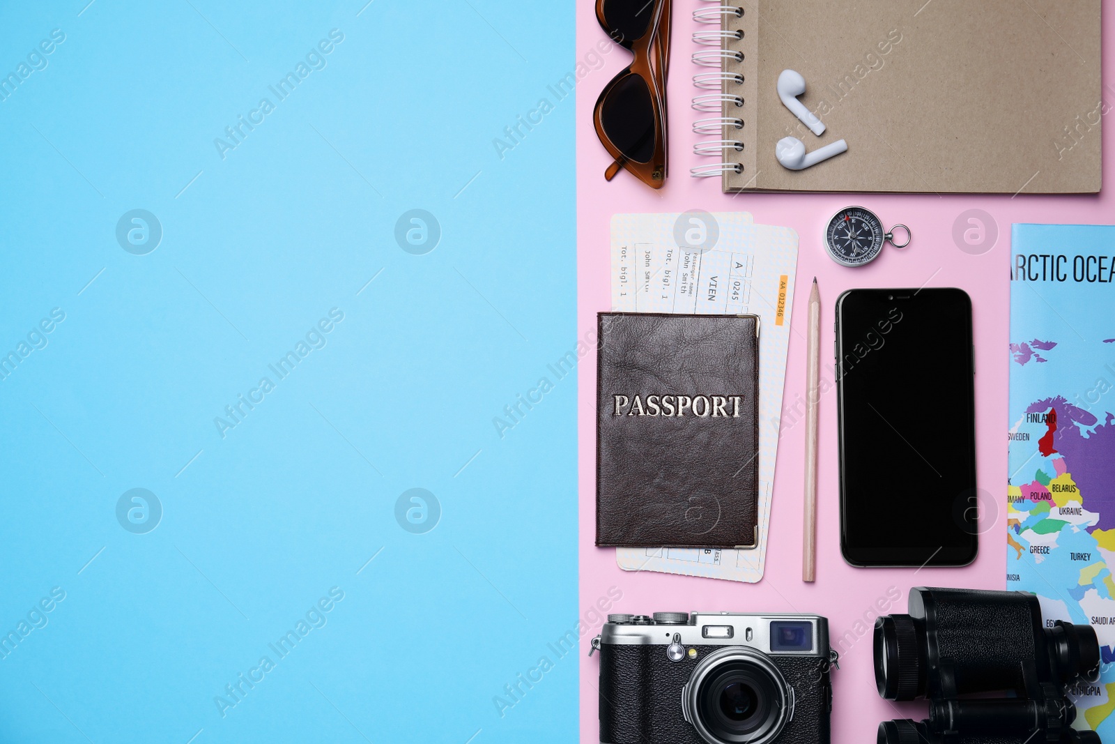 Photo of Flat lay composition with passport, tickets and holiday items on color background. Space for text
